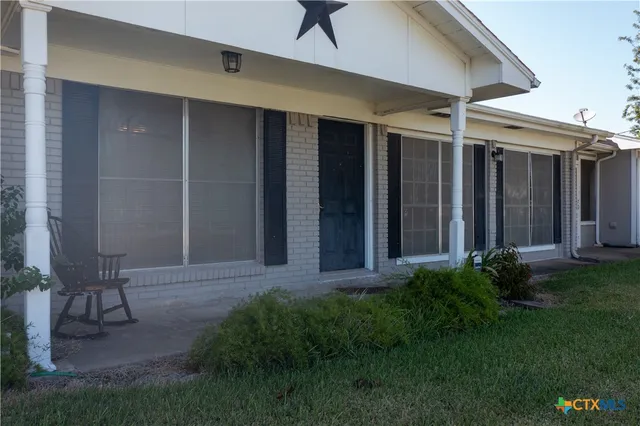 a view of a back yard of the house