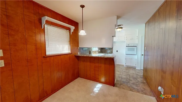 a view of kitchen and window