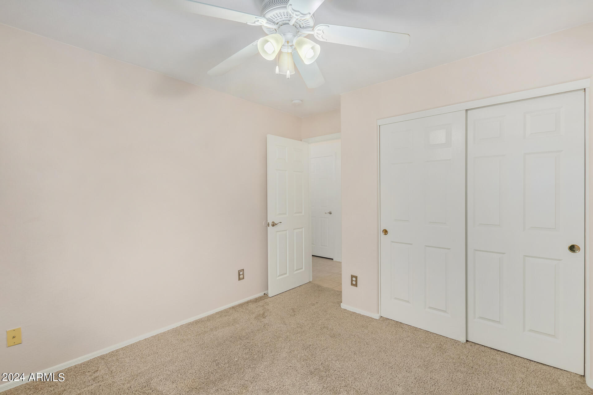 2328 West Carson Road Phoenix, AZ 85041 - Photo 26 of 42 wooden floor in an empty room