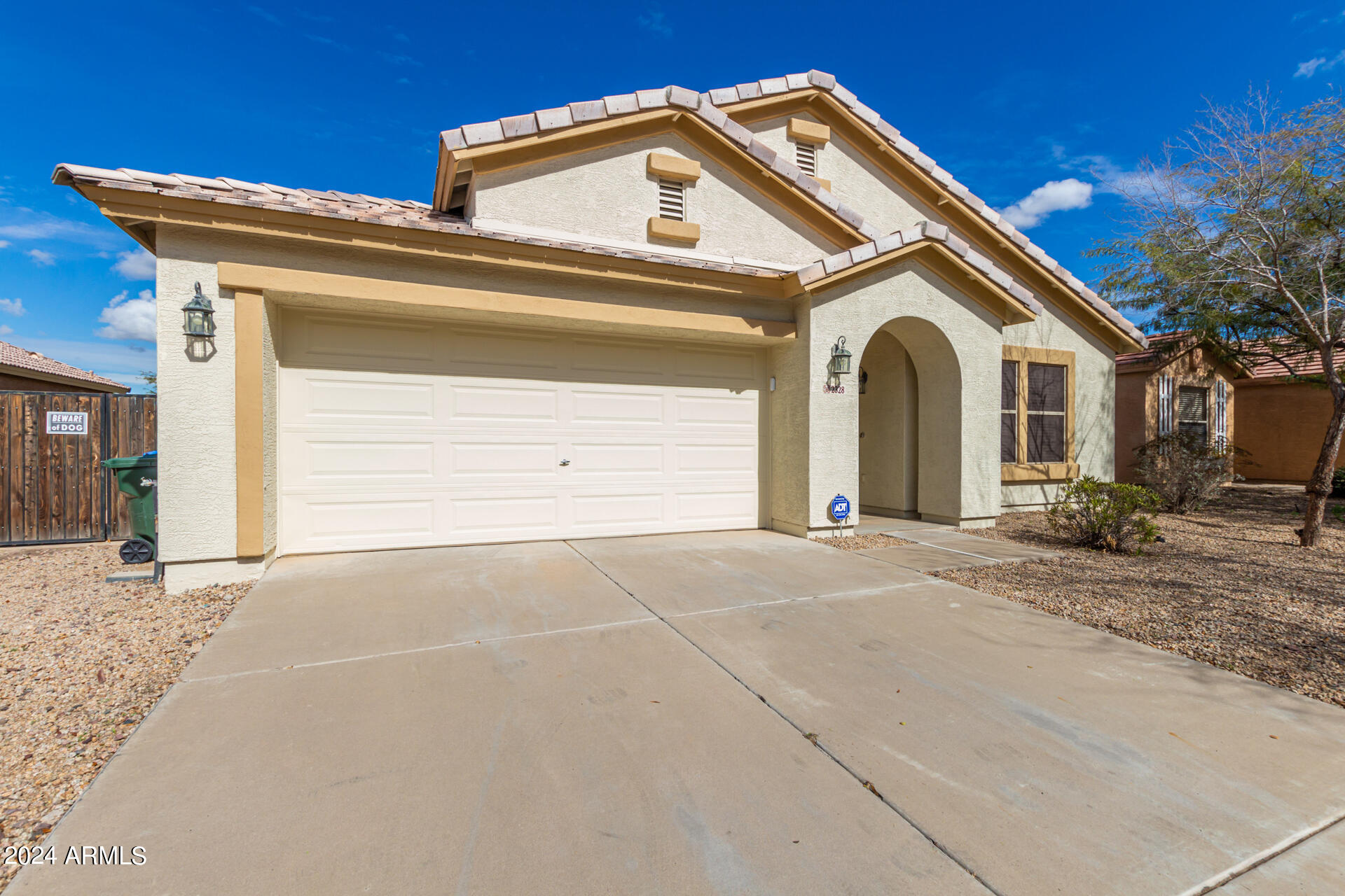 2328 West Carson Road Phoenix, AZ 85041 - Photo 3 of 42 a view of a house with a outdoor space