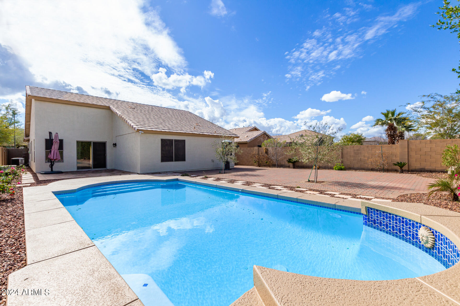 2328 West Carson Road Phoenix, AZ 85041 - Photo 36 of 42 a view of a house with swimming pool