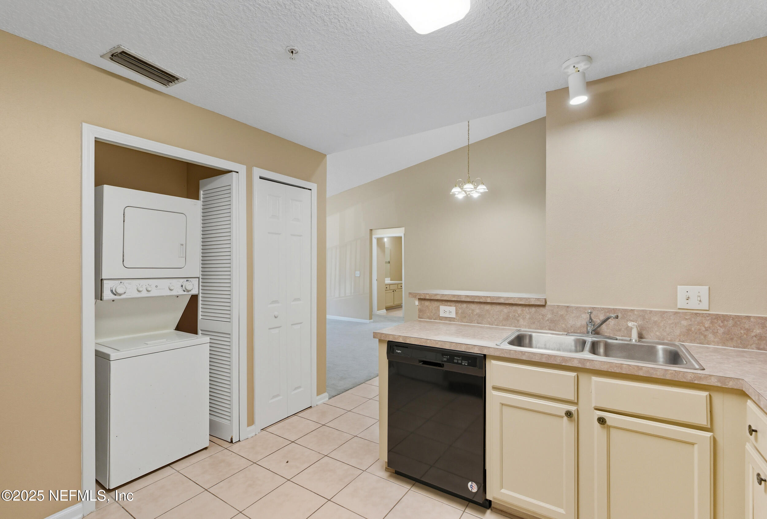 6069 Maggies Circle, Unit 115 Jacksonville, FL 32244 - Photo 13 of 36 a bathroom with a sink and a mirror