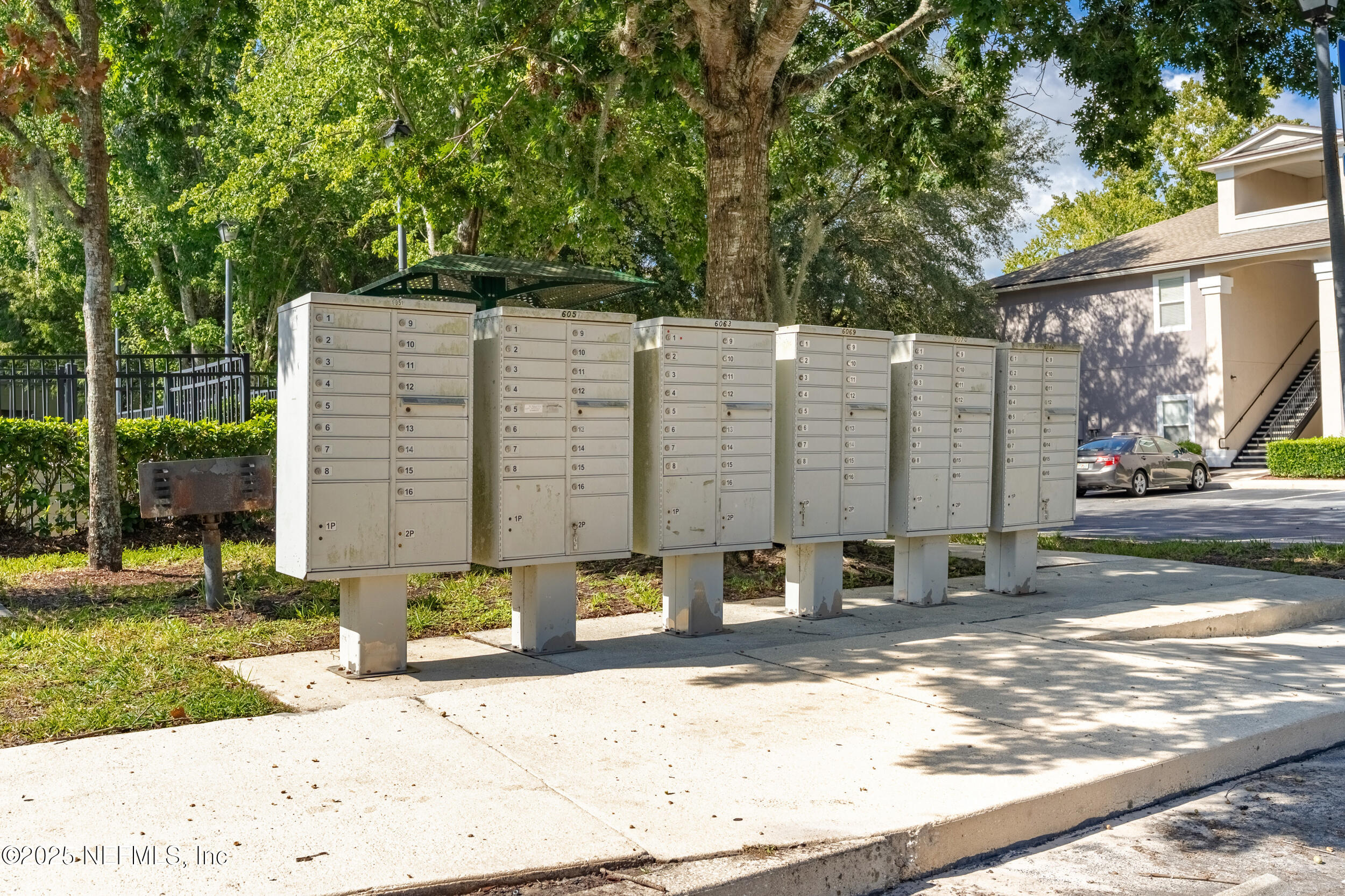 6069 Maggies Circle, Unit 115 Jacksonville, FL 32244 - Photo 32 of 36 a backyard of a house with outdoor seating