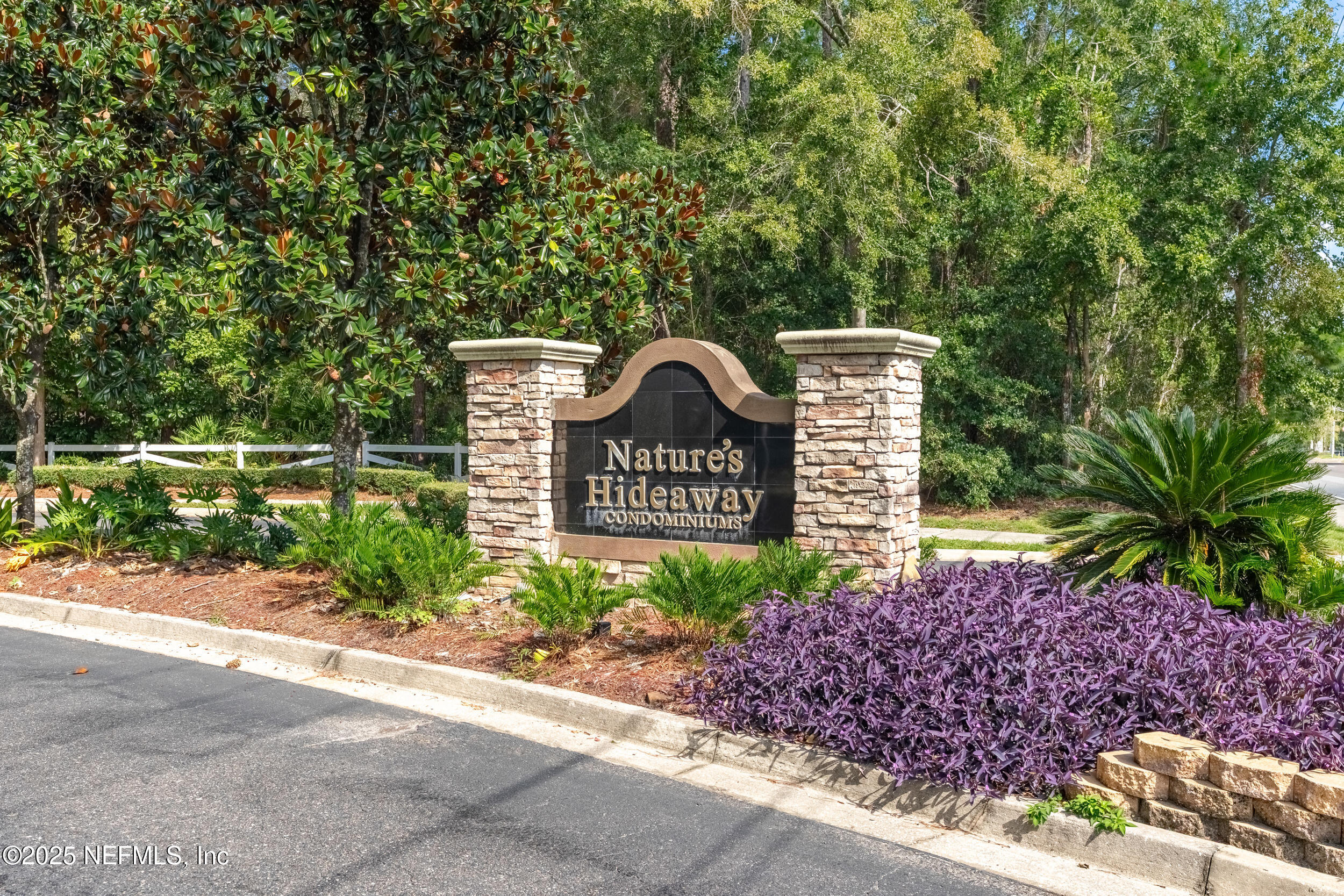 6069 Maggies Circle, Unit 115 Jacksonville, FL 32244 - Photo 36 of 36 a sign on the side of a road