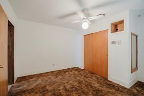 1717 Pipeline Road Cleburne, TX 76033 - Photo 8 of 33 Unfurnished bedroom with a closet, carpet floors, and ceiling fan