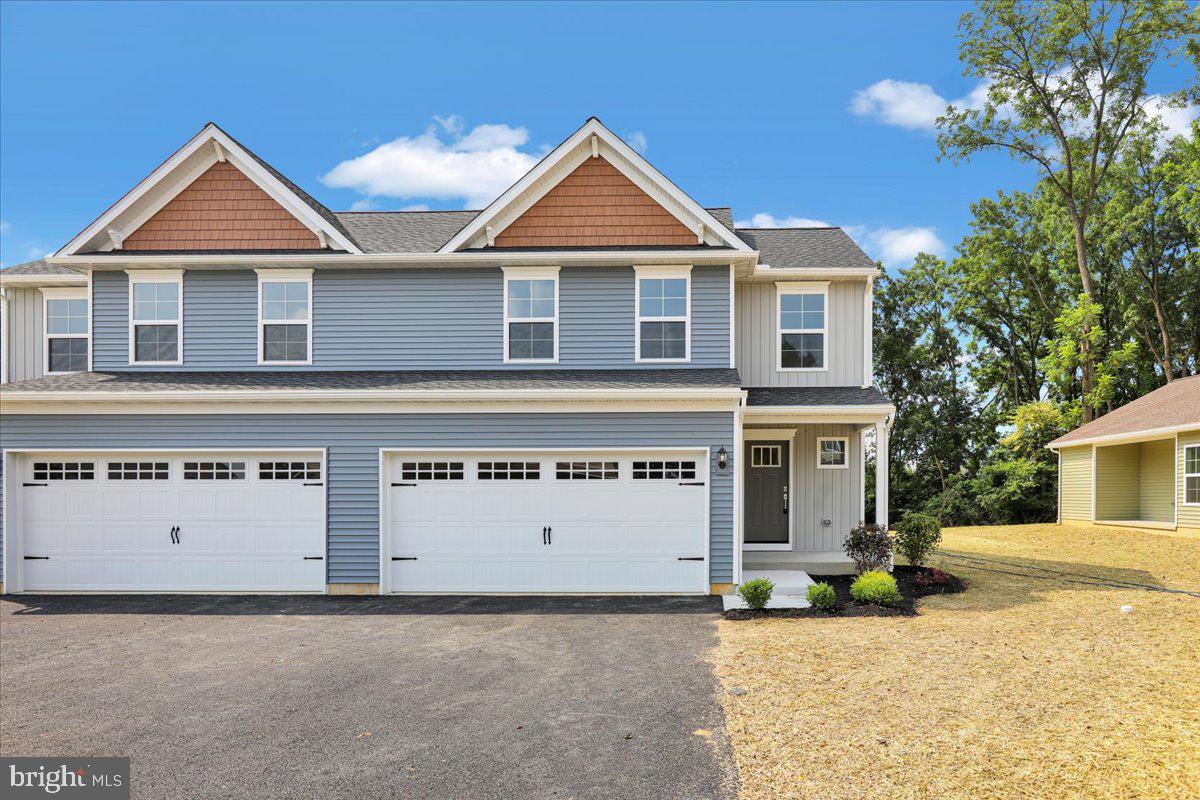 2450 Jefferson Avenue Reading, PA 19609 - Photo 1 of 33 a front view of a house with a yard
