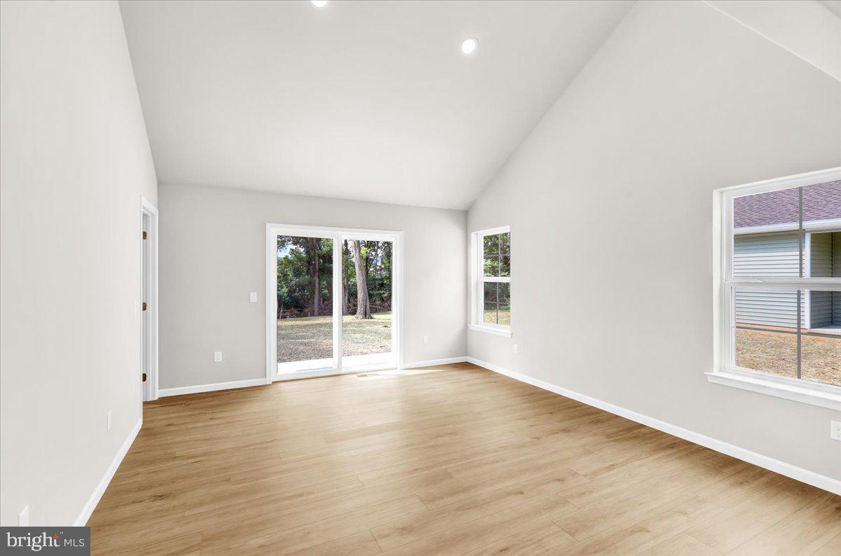 2450 Jefferson Avenue Reading, PA 19609 - Photo 12 of 33 an empty room with wooden floor and windows