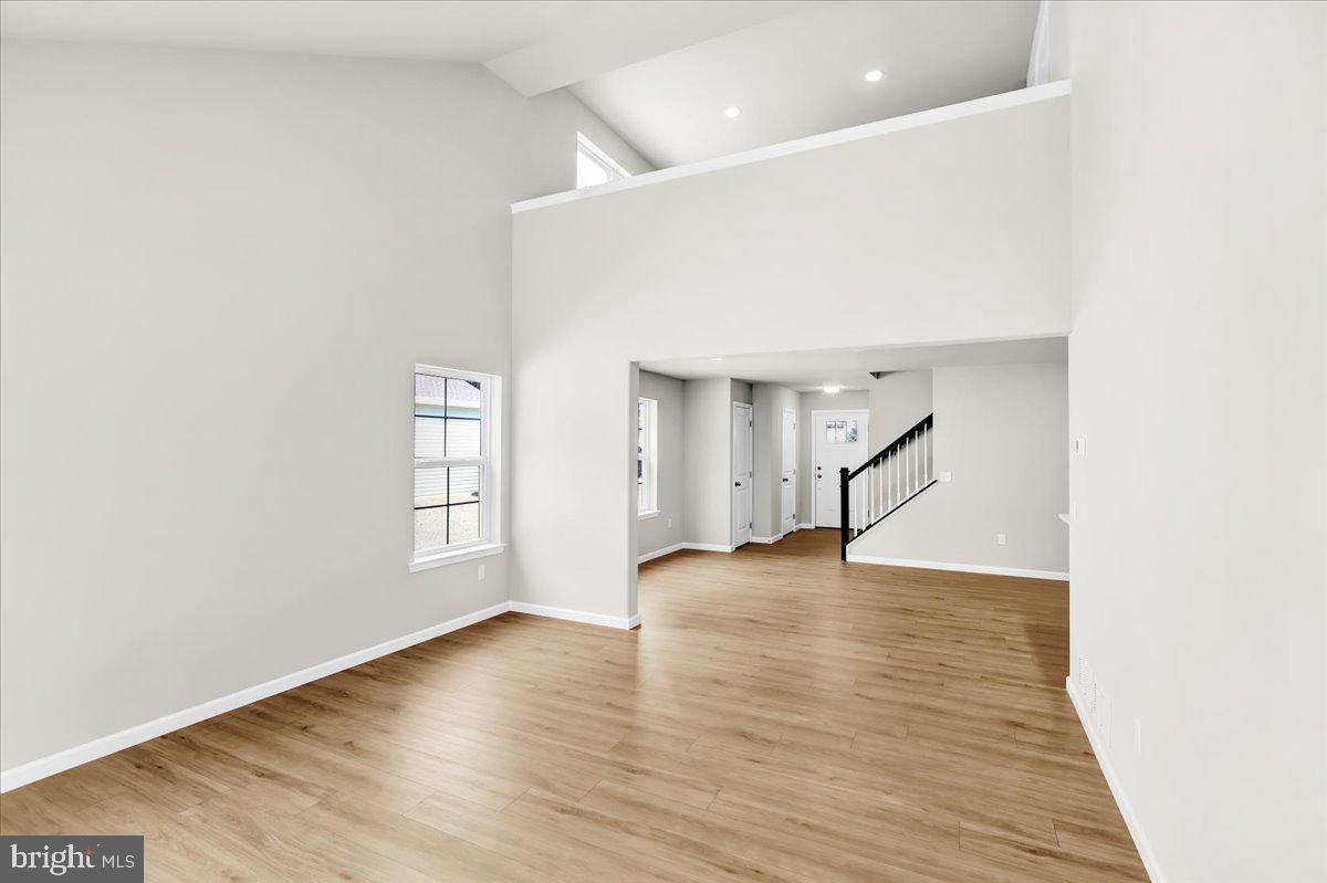 2450 Jefferson Avenue Reading, PA 19609 - Photo 13 of 33 an empty room with wooden floor and windows