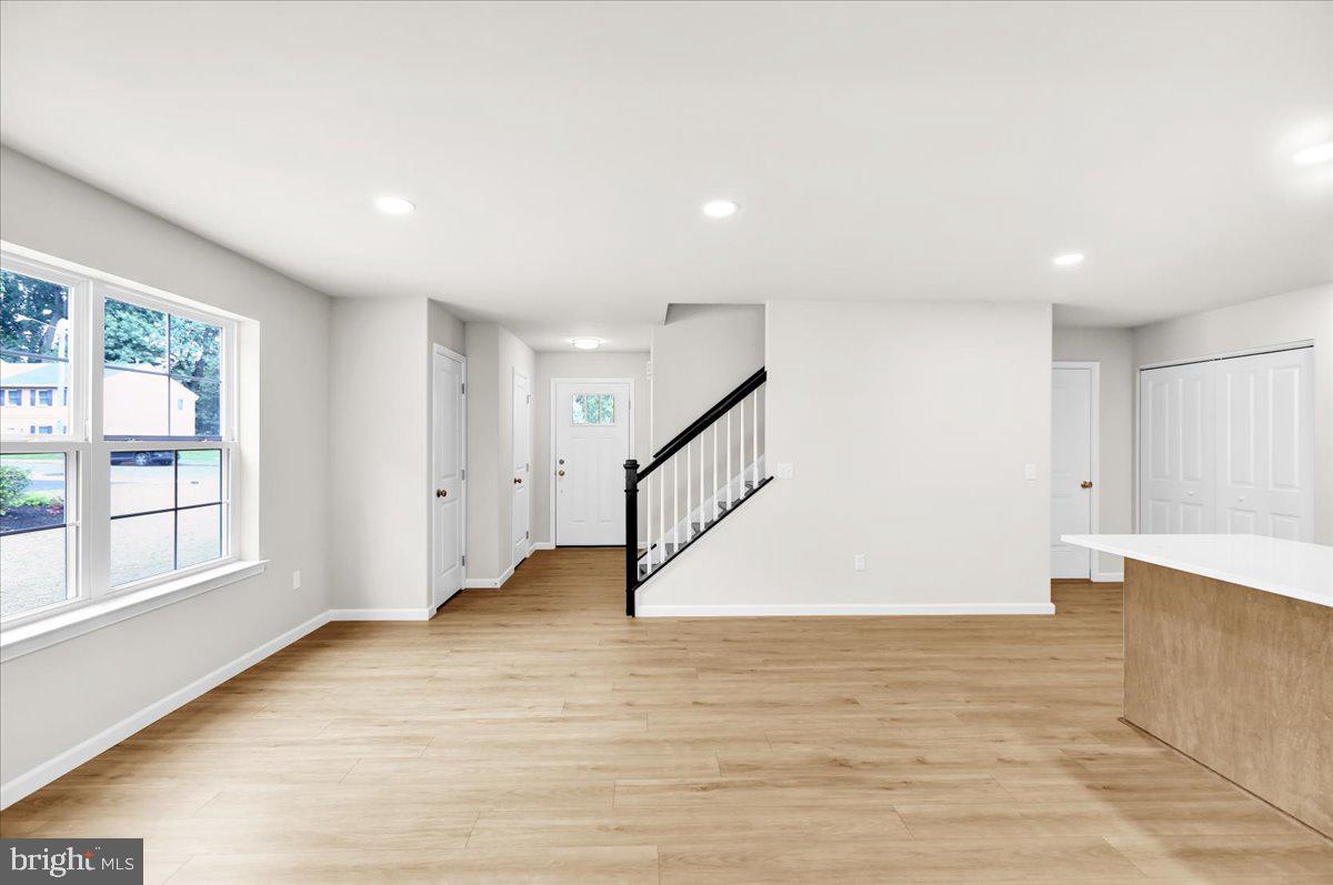 2450 Jefferson Avenue Reading, PA 19609 - Photo 4 of 33 a view of entryway with wooden floor and stairs