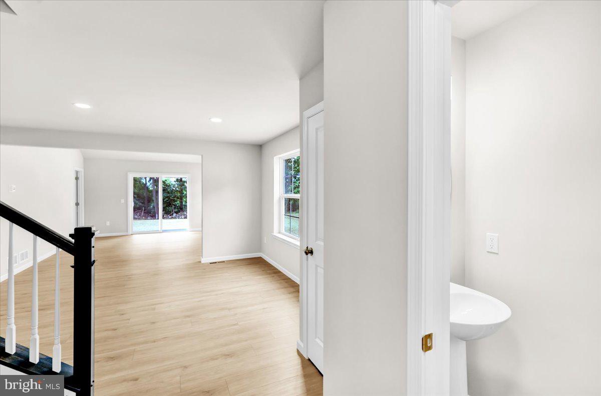 2450 Jefferson Avenue Reading, PA 19609 - Photo 5 of 33 a view of empty room with wooden floor and window