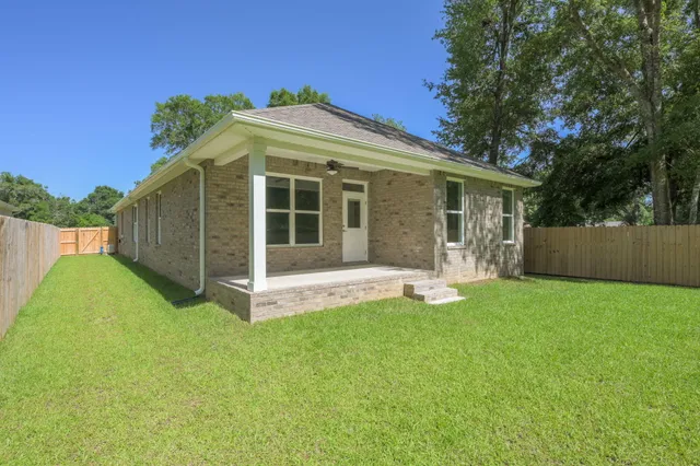 a view of a yard with a slide