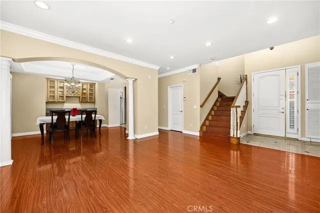 a dining room with furniture window wooden floor