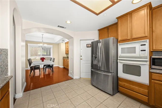 a bathroom with a sink toilet and mirror