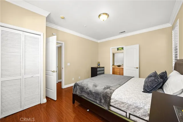 a view of a patio with a table and chairs and potted plants
