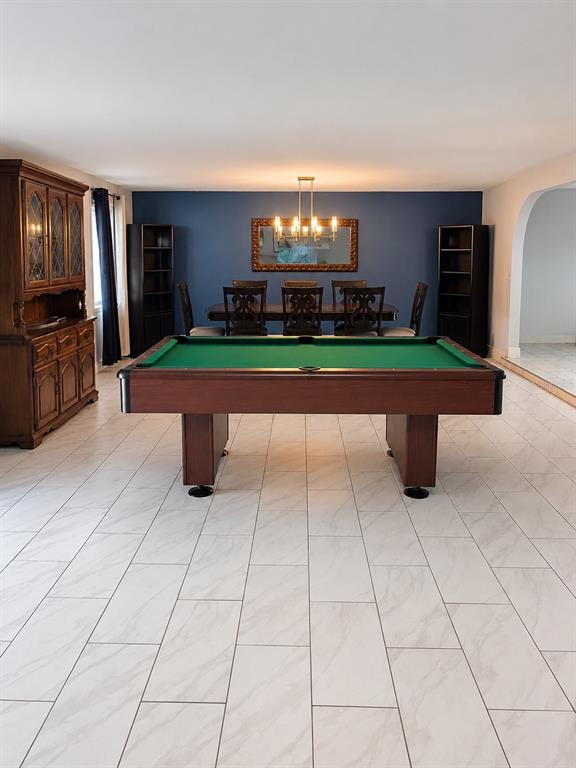 490 Water Road Ocala, FL 34472 - Photo 4 of 12 a room with pool table and windows