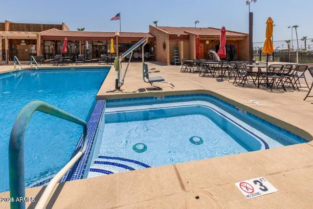 a view of a terrace with seating area