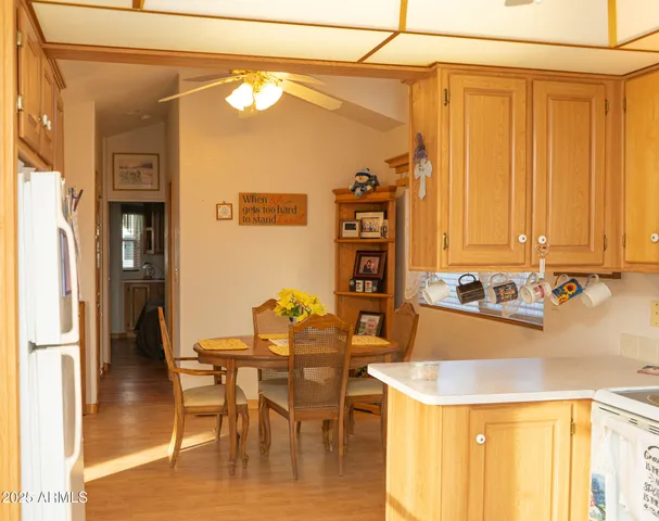a kitchen with a table and chairs in it