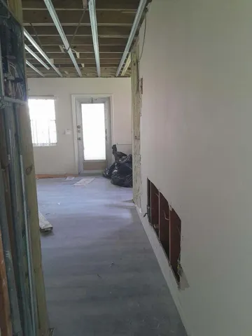 a view of hallway with stairs