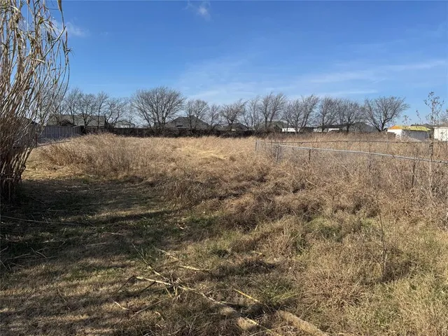 a view of a lake from a yard