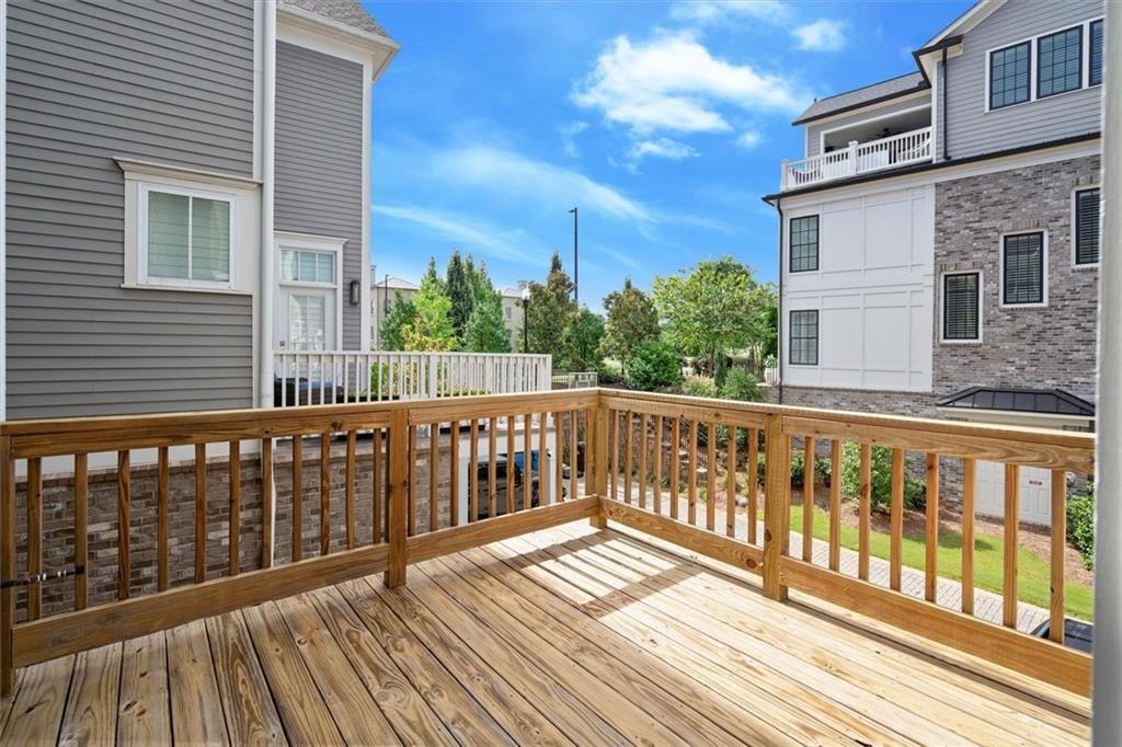 293 Thompson Street Alpharetta, GA 30009 - Photo 14 of 71 a view of balcony with wooden floor