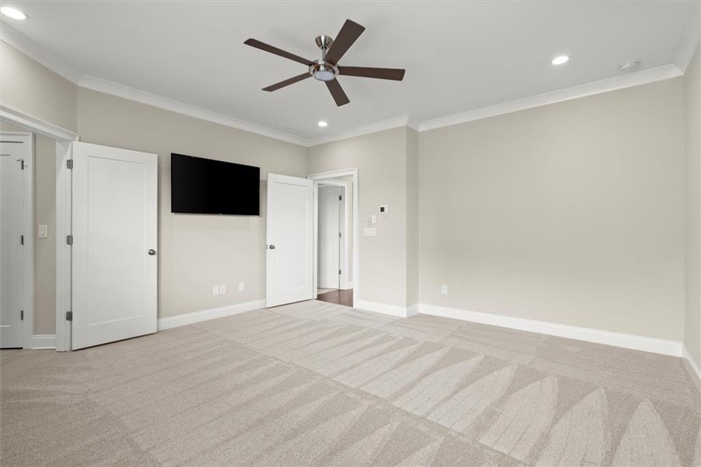 293 Thompson Street Alpharetta, GA 30009 - Photo 34 of 71 a view of a livingroom with a flat screen tv
