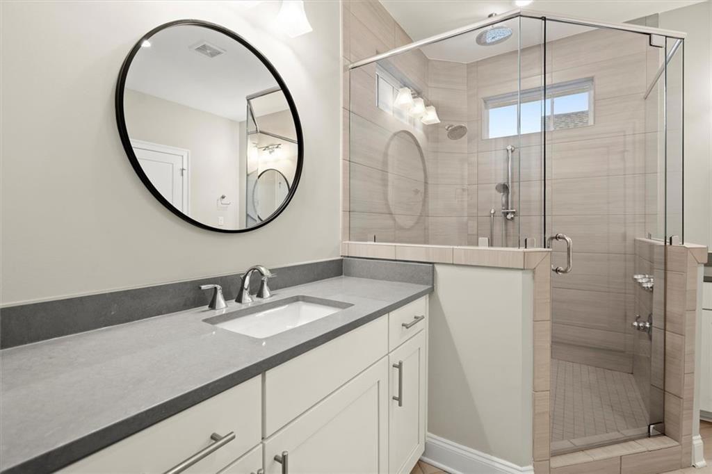 293 Thompson Street Alpharetta, GA 30009 - Photo 36 of 71 a bathroom with a sink and a mirror