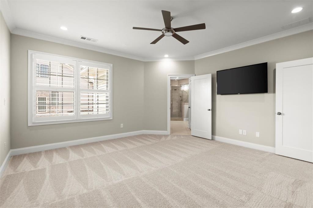 293 Thompson Street Alpharetta, GA 30009 - Photo 4 of 71 a view of a livingroom with a ceiling fan and window