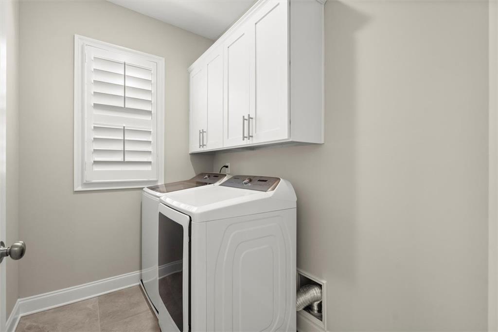 293 Thompson Street Alpharetta, GA 30009 - Photo 43 of 71 a utility room with dryer and washer