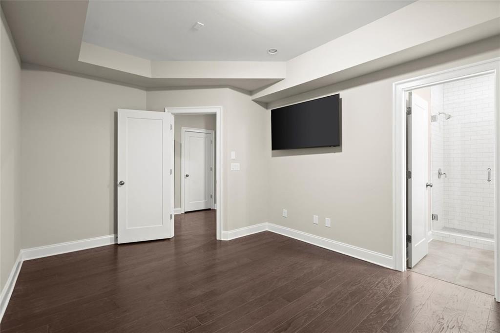 293 Thompson Street Alpharetta, GA 30009 - Photo 47 of 71 an empty room with wooden floor and window