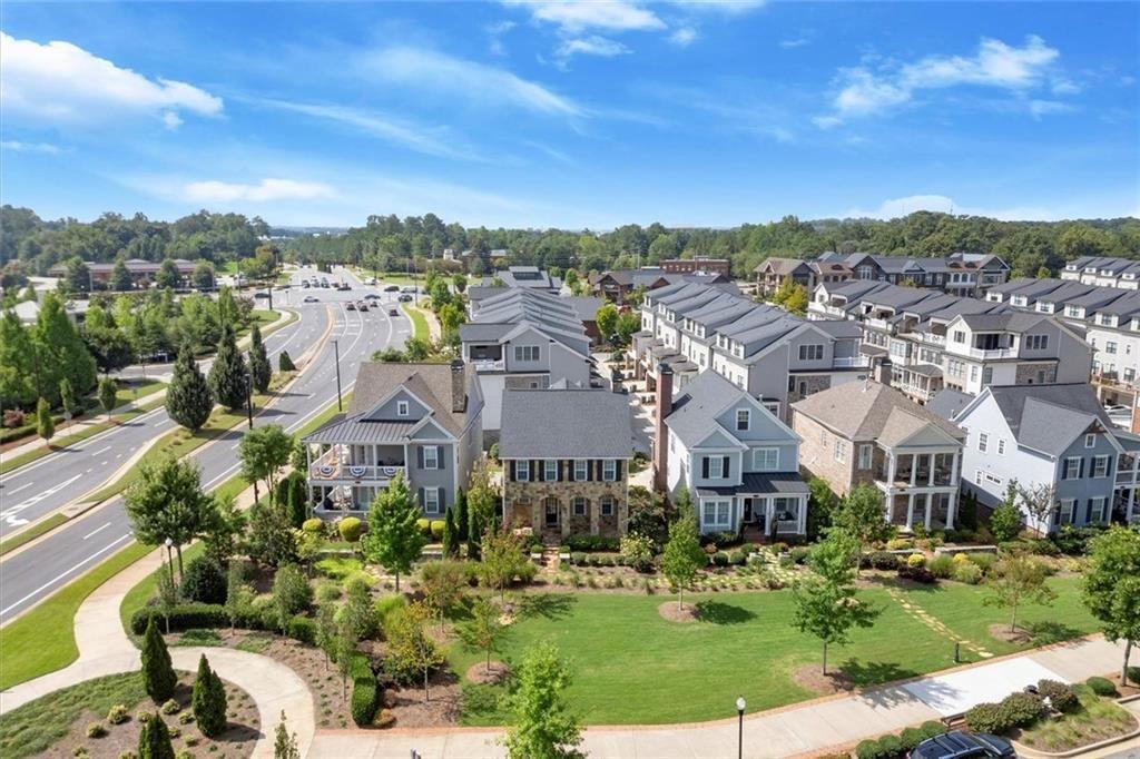 293 Thompson Street Alpharetta, GA 30009 - Photo 54 of 71 an aerial view of residential houses with outdoor space and trees