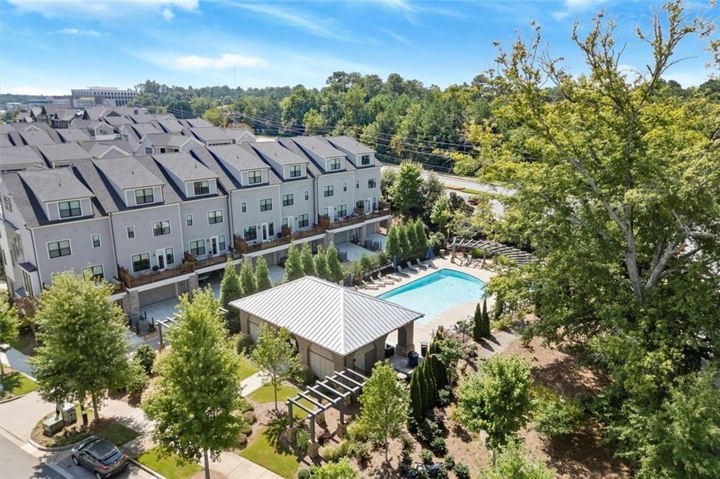 293 Thompson Street Alpharetta, GA 30009 - Photo 57 of 71 a view of a swimming pool with a yard