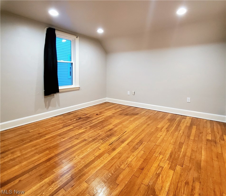 4348 Prasse Road South Euclid, OH 44121 - Photo 8 of 10 Bedroom three, located on the second floor, with refinished wood floor and attached flex-room