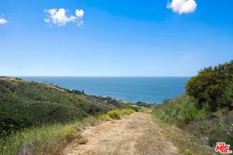a view of a lake with a beach