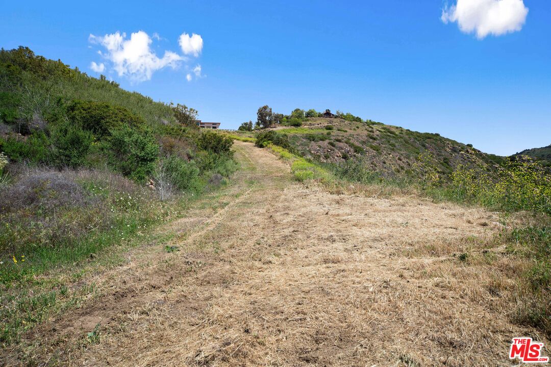 4250 Decker Edison Road Malibu, CA 90265 - Photo 18 of 25 a view of a houses with a yard