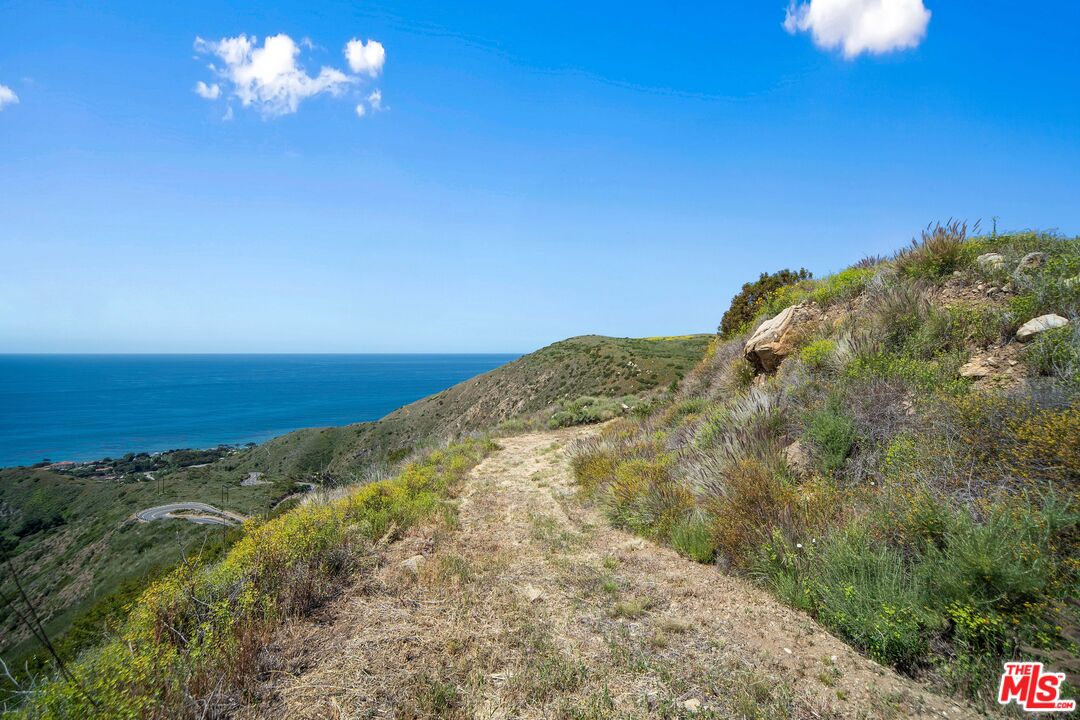 4250 Decker Edison Road Malibu, CA 90265 - Photo 24 of 25 a view of a big room with a mountain in the background