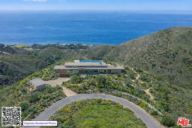 a view of ocean and mountain