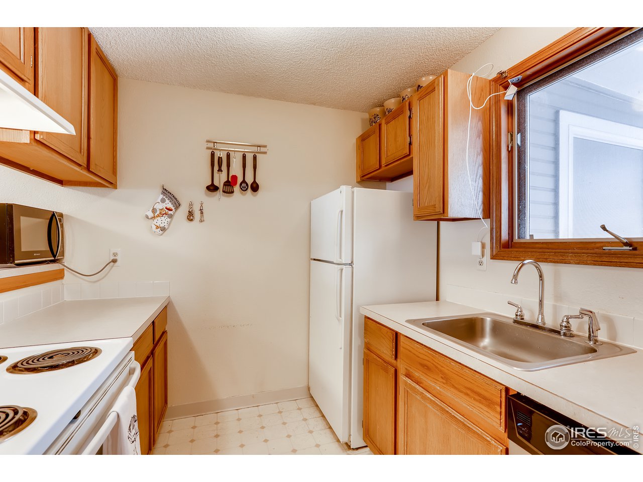 1231 West Swallow Road, Unit 311 Fort Collins, CO 80526 - Photo 14 of 28 Kitchen