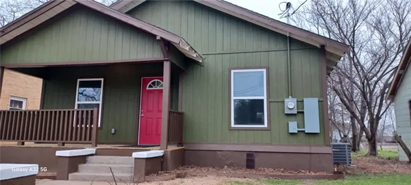 a view of a backyard with a garden