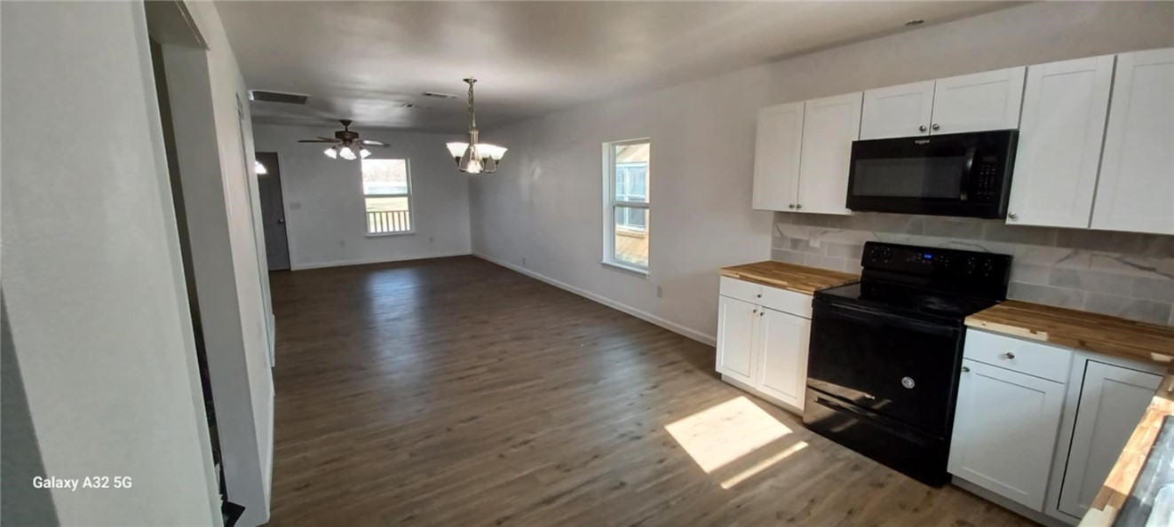 1005 Taylor Street Waco, TX 76704 - Photo 7 of 14 a view of a kitchen from the hallway