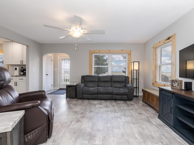 2950 County Road 1100 North Gridley, IL 61744 - Photo 12 of 38 a living room with furniture and a flat screen tv
