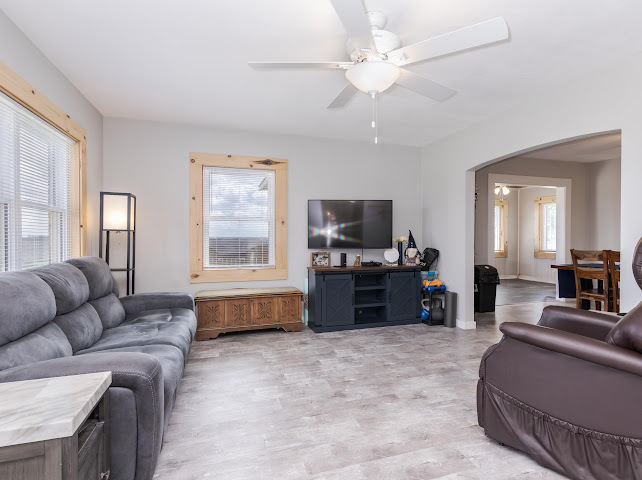 2950 County Road 1100 North Gridley, IL 61744 - Photo 13 of 38 a living room with furniture and a flat screen tv