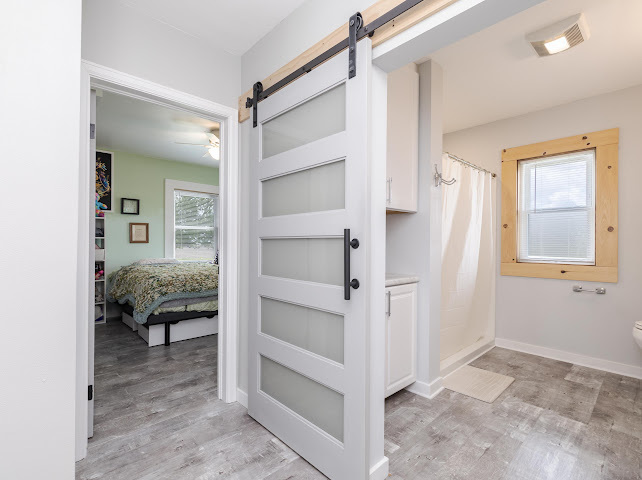 2950 County Road 1100 North Gridley, IL 61744 - Photo 20 of 38 a view of a bedroom with closet and windows