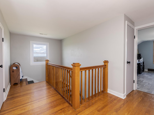 2950 County Road 1100 North Gridley, IL 61744 - Photo 26 of 38 a view of a room with wooden floor and windows