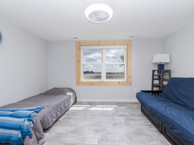 2950 County Road 1100 North Gridley, IL 61744 - Photo 31 of 38 a view of bedroom with furniture and a window