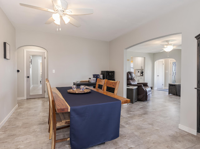 2950 County Road 1100 North Gridley, IL 61744 - Photo 9 of 38 a living room with furniture and a chandelier
