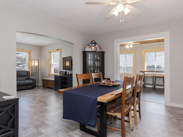 2950 County Road 1100 North Gridley, IL 61744 - Photo 10 of 38 a view of a dining room with furniture and chandelier