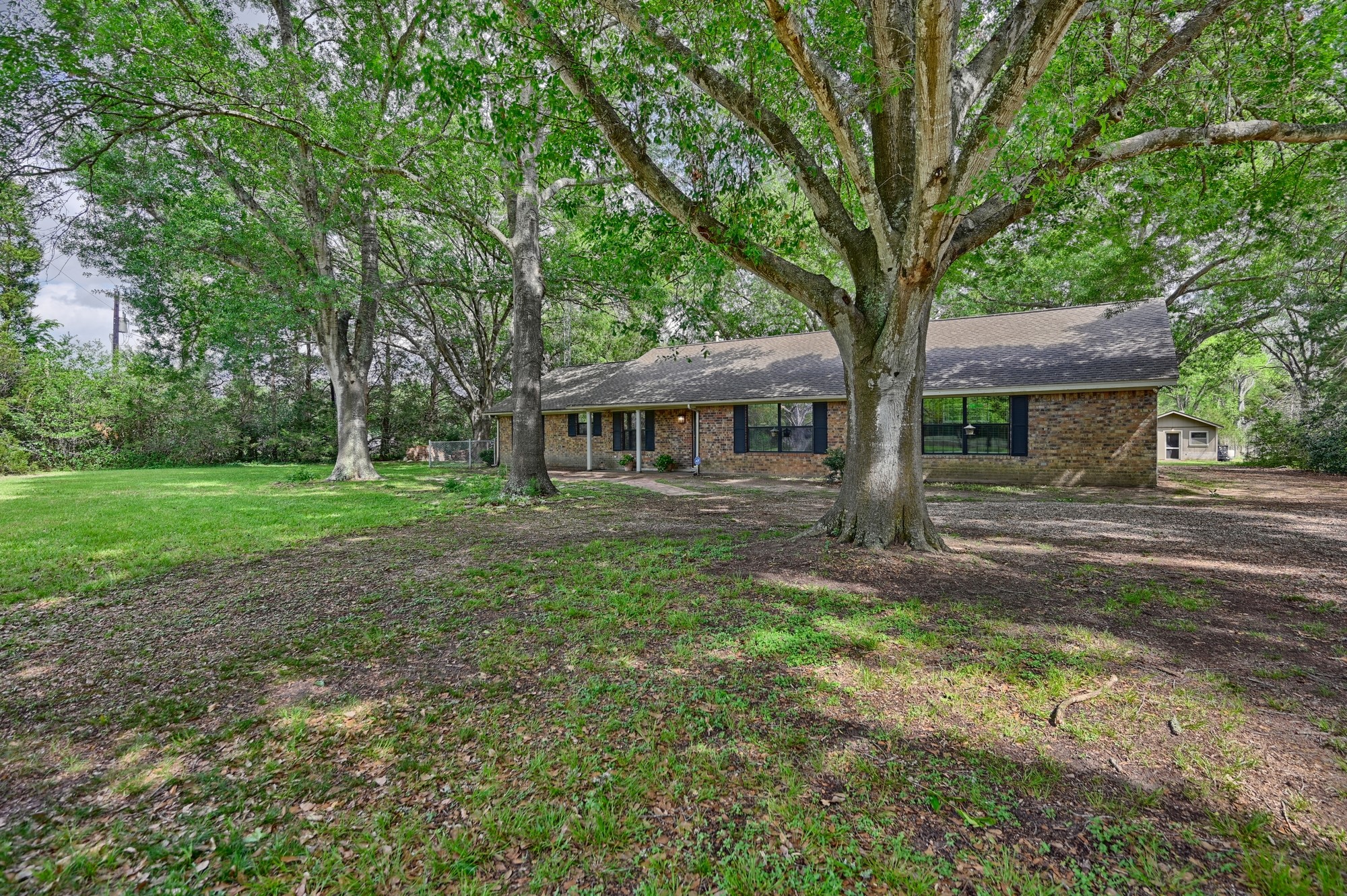 6201 Fm 389 Brenham, TX 77833 - Photo 22 of 50 a front view of a house with yard