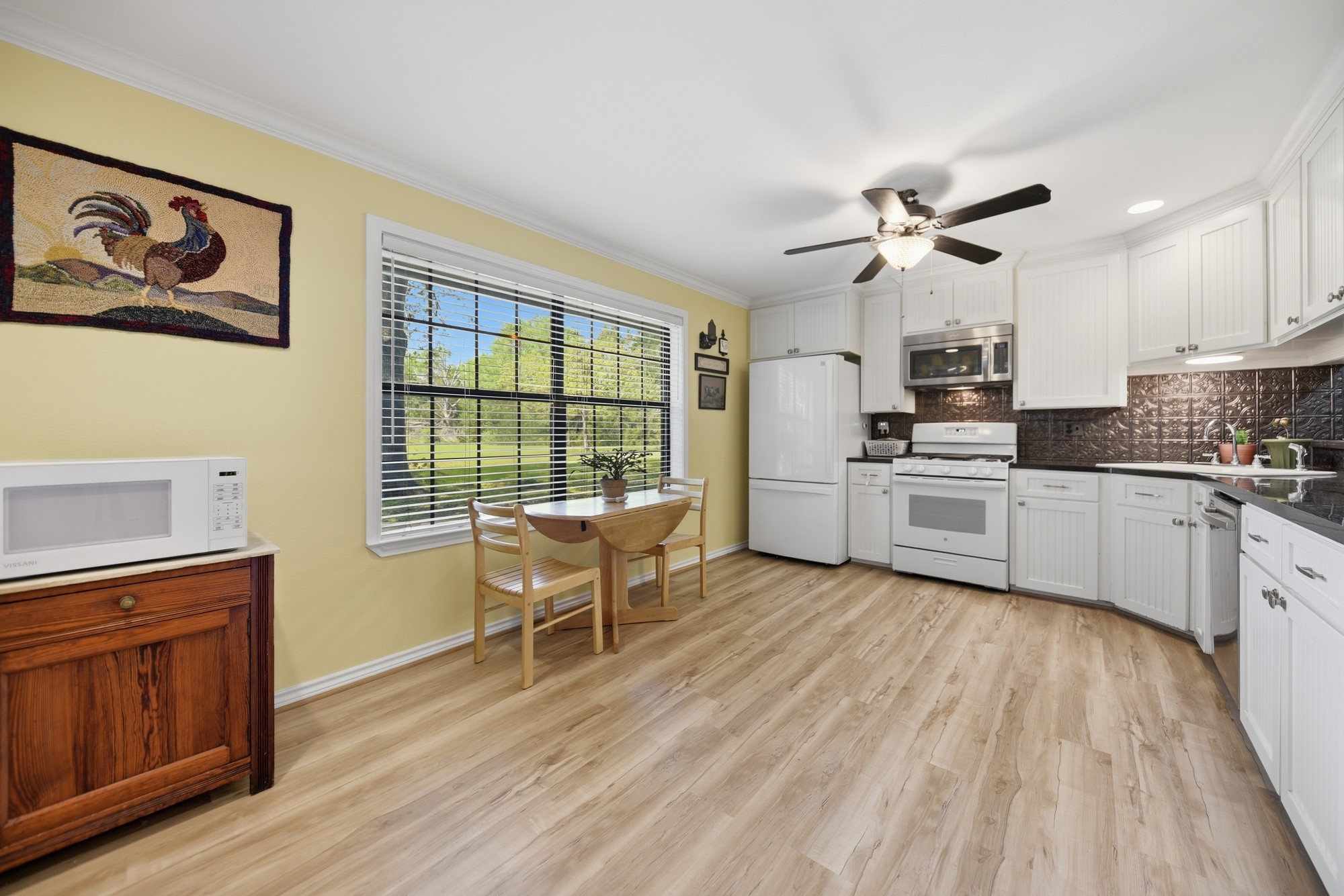 6201 Fm 389 Brenham, TX 77833 - Photo 35 of 50 a kitchen with furniture cabinets and wooden floor