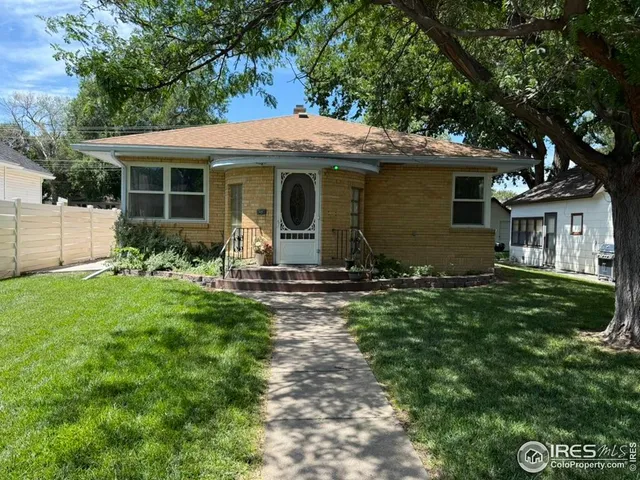 a front view of house with yard