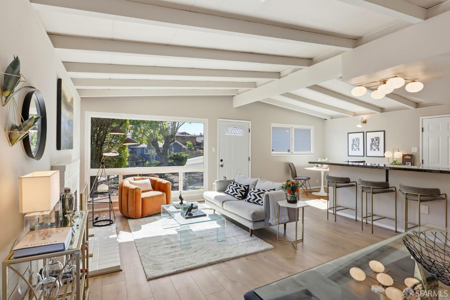 656 Pebble Drive El Sobrante, CA 94803 - Photo 14 of 41 a living room with furniture and a large window